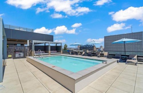 West Gateway Apartment | Top-Floor Gem & Heated Pool Walk to Attractions