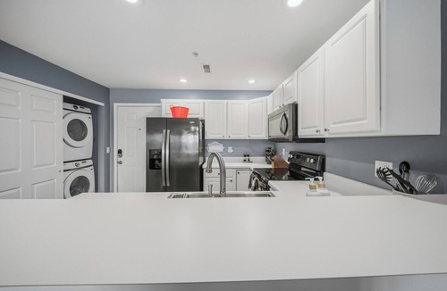 Kaiser Condo | Updated Lakefront Condo 2/2, Amazing Views, Location, Pool, Waterfront Patio!
