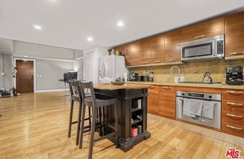 Historic Core Condo | Urban Chic 1-bedroom Loft w Cathedral Ceilings + Skylight in Vibrant Los Angeles