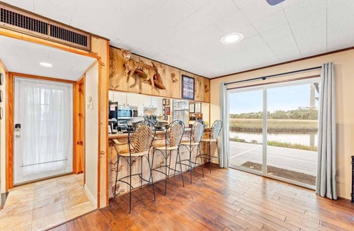 Northside Cabin | Waterfront Fishing Lodge, King Bed, StovePipe Fireplace, Peaceful