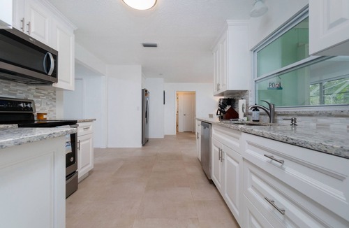 Laurel House | Welcome to your santuary! New 25 rates for oversized pool and quiet corner lot.