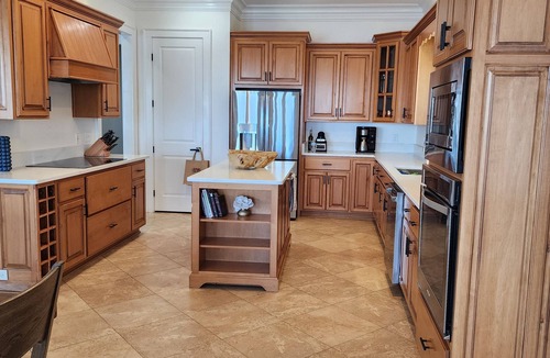 Gulf Breeze House | Your Bayfront Retreat with Stunning Water Views, Private Pool, and Dock.