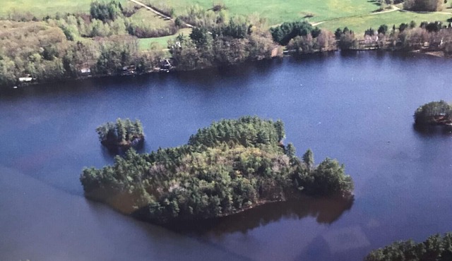 A Private 7-Acre Island Sanctuary on Flying Pond in Maine’s Scenic Lake Country