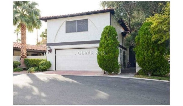 Beautiful gated community 4 bedroom 4 bath home located close to the Strip