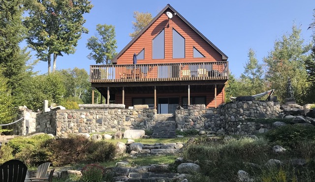 Beautiful year round lakefront home on crystal clear Great Moose Lake