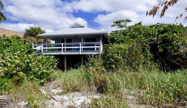Charming Beachfront Cottage with Private Dock on Little Gasparilla Island, Florida