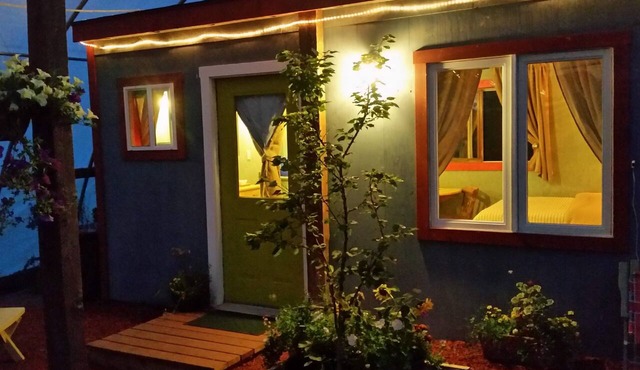 Cottage In A Greenhouse