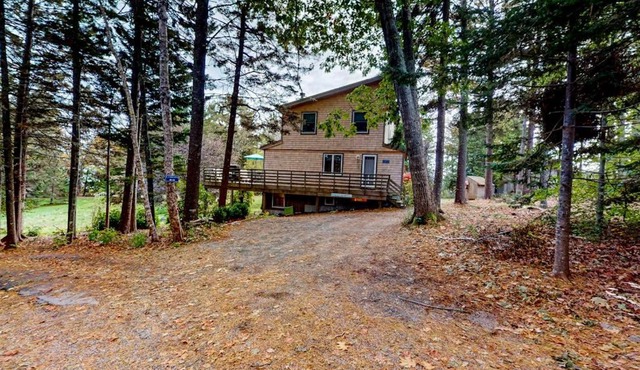 Dog-friendly 3-story home with wood stove, deck, grill, ocean views, W/D, AC
