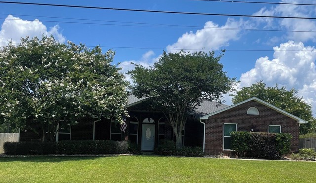 Elegant single level with 4 BR 3 BA, private oasis featuring a heated salt pool
