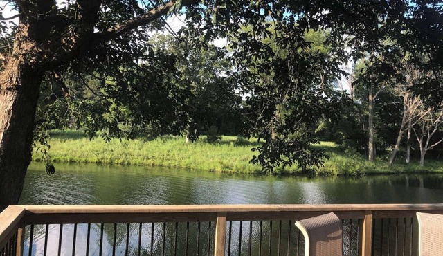 Escape to a private 3BR waterfront retreat on a 7-acre pond near Route 66. Enjoy peaceful views, a fire pit with seating, fishing dock, and spacious living areas. Perfect for relaxing getaways with easy access to St. Louis attractions.