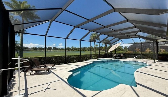 Executive Pool Home In Gated Community Overlooking Golf Course