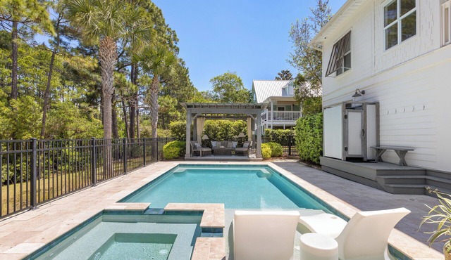 Four Palms Lakefront Home with Dock + Pool & Bikes