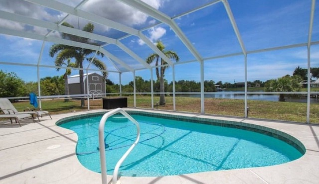 Gorgeous 3 BR / 2 BA home with heated pool on the canal. Sleeps 6