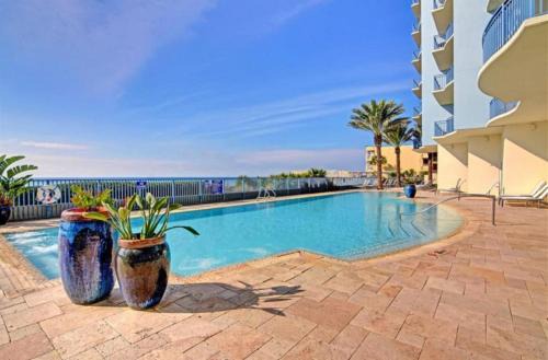 Gulf-View Condo with Pool, Grill, Gym & Beachfront Resort Perks!