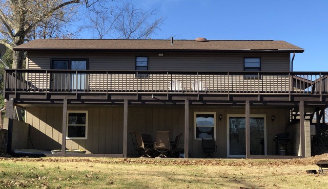 Lake of Egypt 4 bedroom home sleeps 8 with dock and flat yard and lakefront!