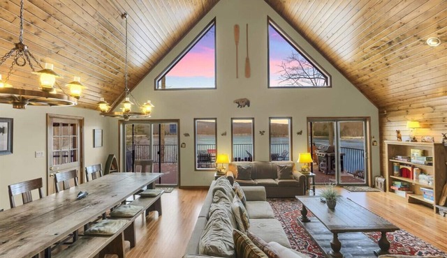 Lakefront cabin - incredible views, beach, fire pit, boats, hot tub, game rooms