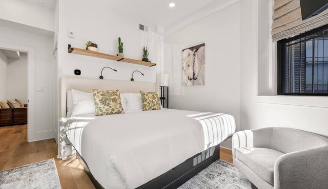 Luxury 1BR: Sleek Kitchen + City Charm | Suite 2