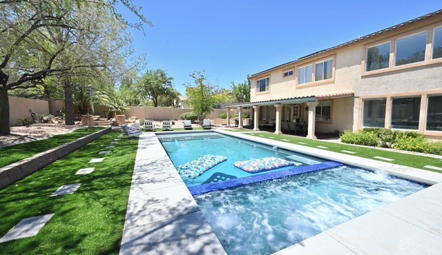 Modern home 12 min from strip, Swimming pool , , enclosed yard, backyard oasis