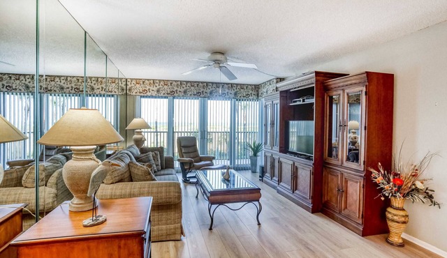 Second floor condo with pool and tennis court private WD and central AC