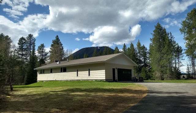 Stay at Glacier's Doorstep! Just a minute or two from the park's west entrance.