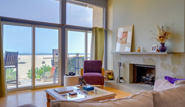Sunsets and sweeping views, sliding doors open to the sand