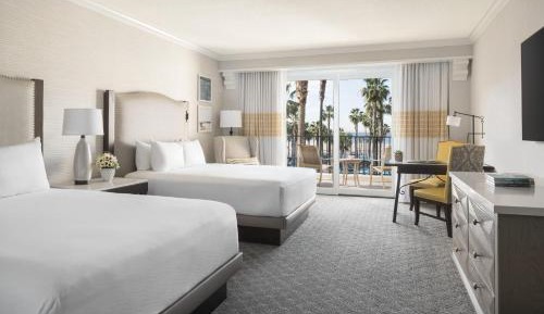 2 Queen Beds Partial Ocean View